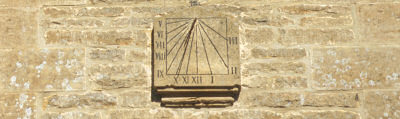 Sundial on the wall of the mill